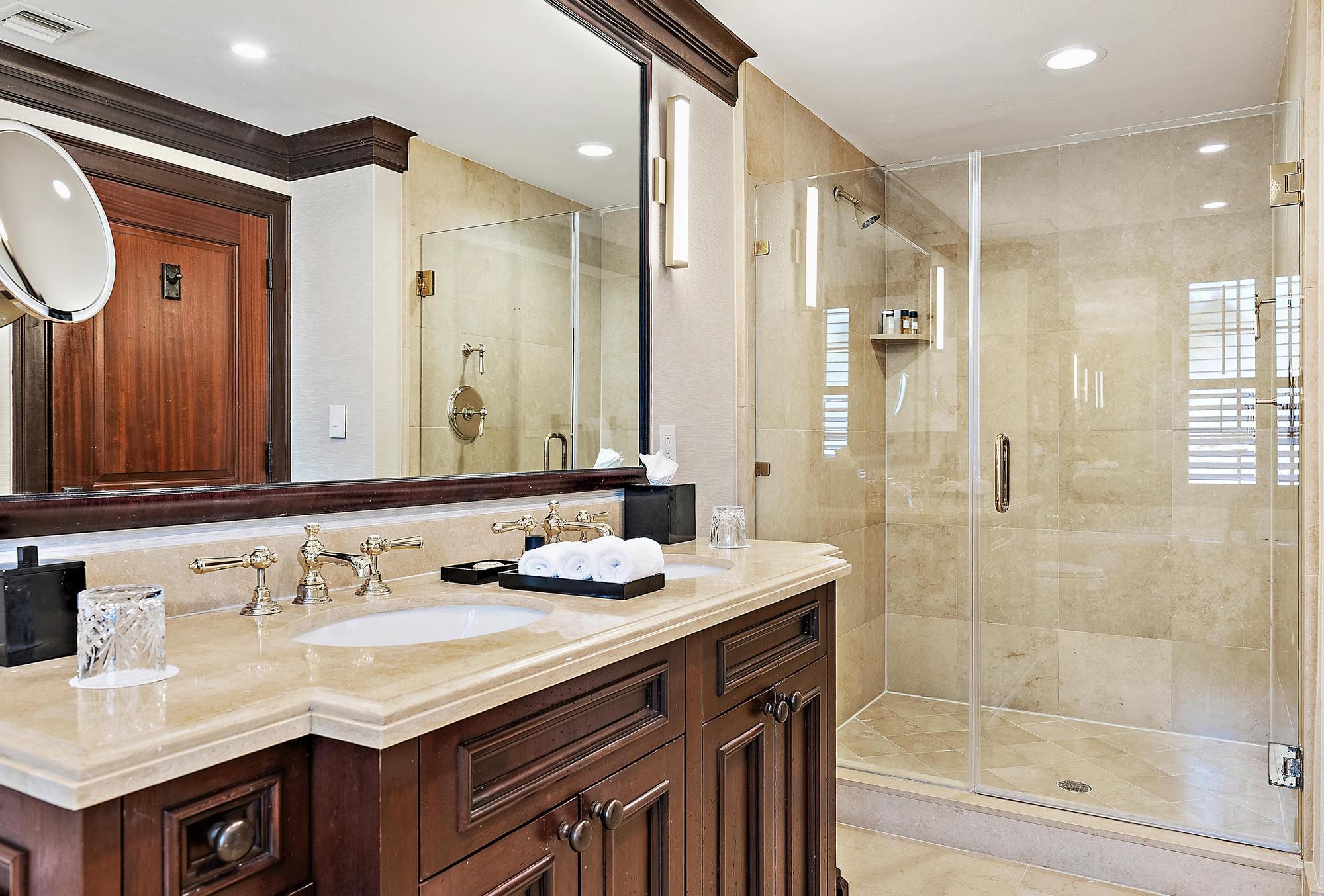 301 Australian Avenue, Unit 301 Palm Beach, FL 33480 - Photo 18 of 26 a bathroom with a granite countertop sink mirror and double