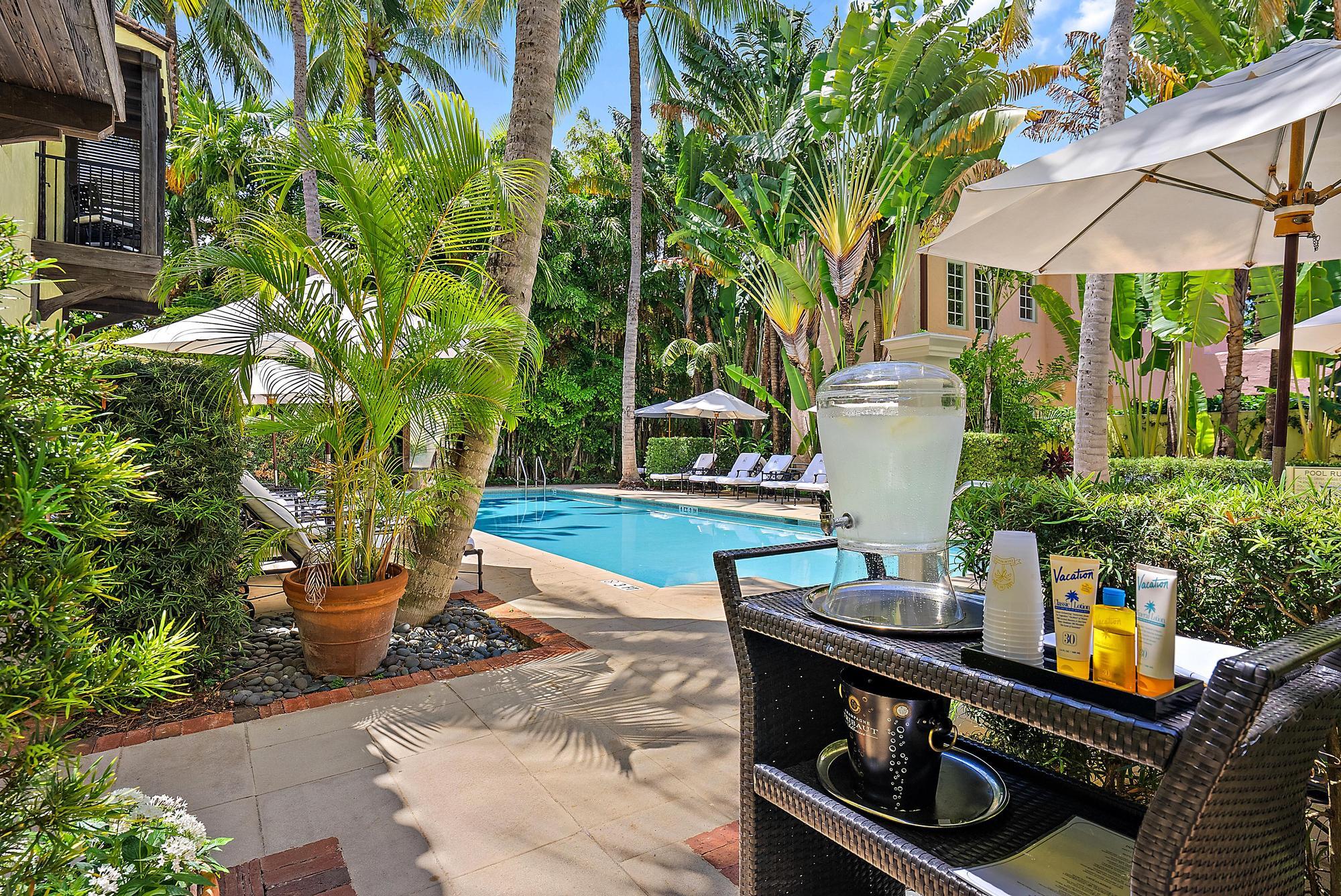 301 Australian Avenue, Unit 301 Palm Beach, FL 33480 - Photo 21 of 26 a view of a backyard with sitting area