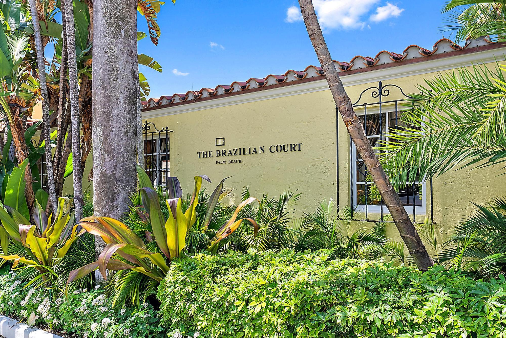 301 Australian Avenue, Unit 301 Palm Beach, FL 33480 - Photo 3 of 26 a sign on the wall next to a road