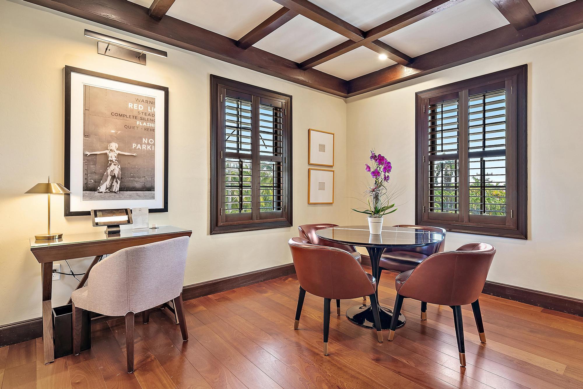 301 Australian Avenue, Unit 301 Palm Beach, FL 33480 - Photo 9 of 26 a view of a dining room with furniture window and wooden floor