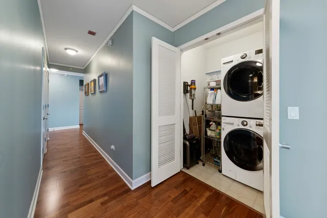 a view of a hallway with washer and dryer