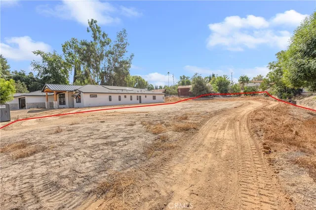 a view of swimming pool with a yard