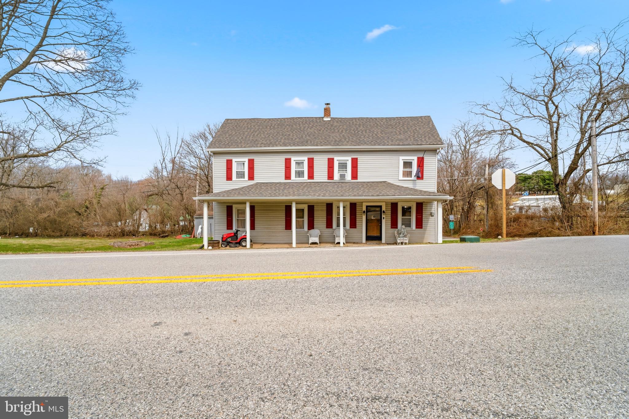 16700 Frederick Road Mount Airy, MD 21771 - Photo 5 of 45 a front view of a house with swimming pool