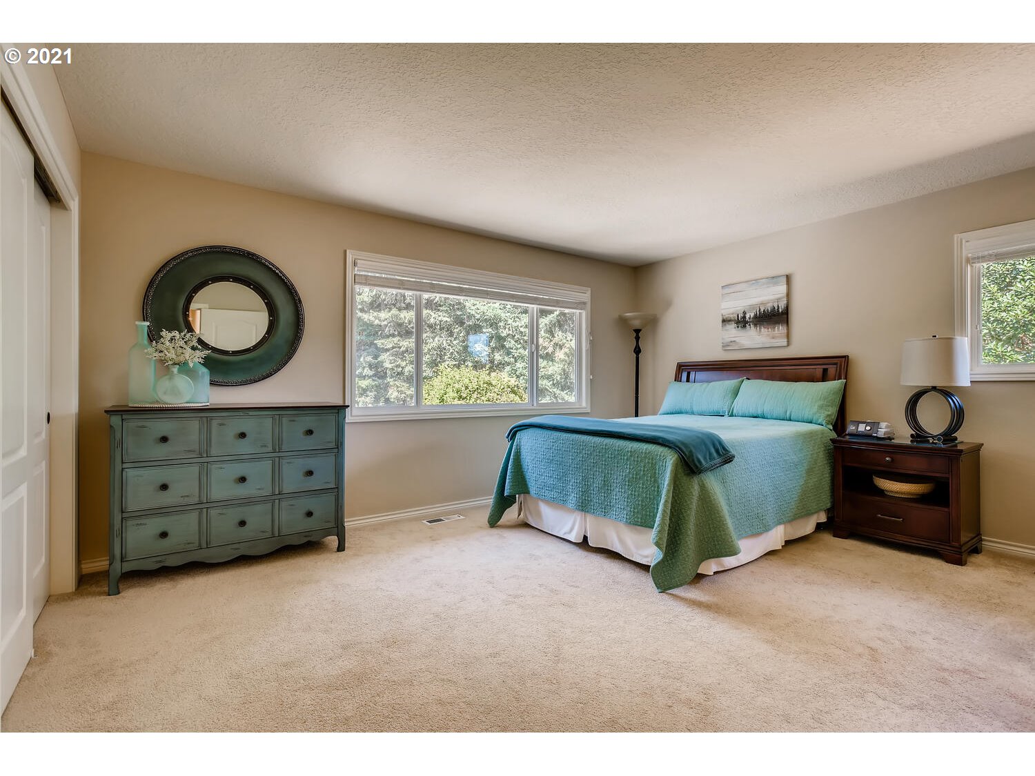 34351 Southwest South Ranch Road Newberg, OR 97132 - Photo 14 of 32 a bedroom with a bed and a closet