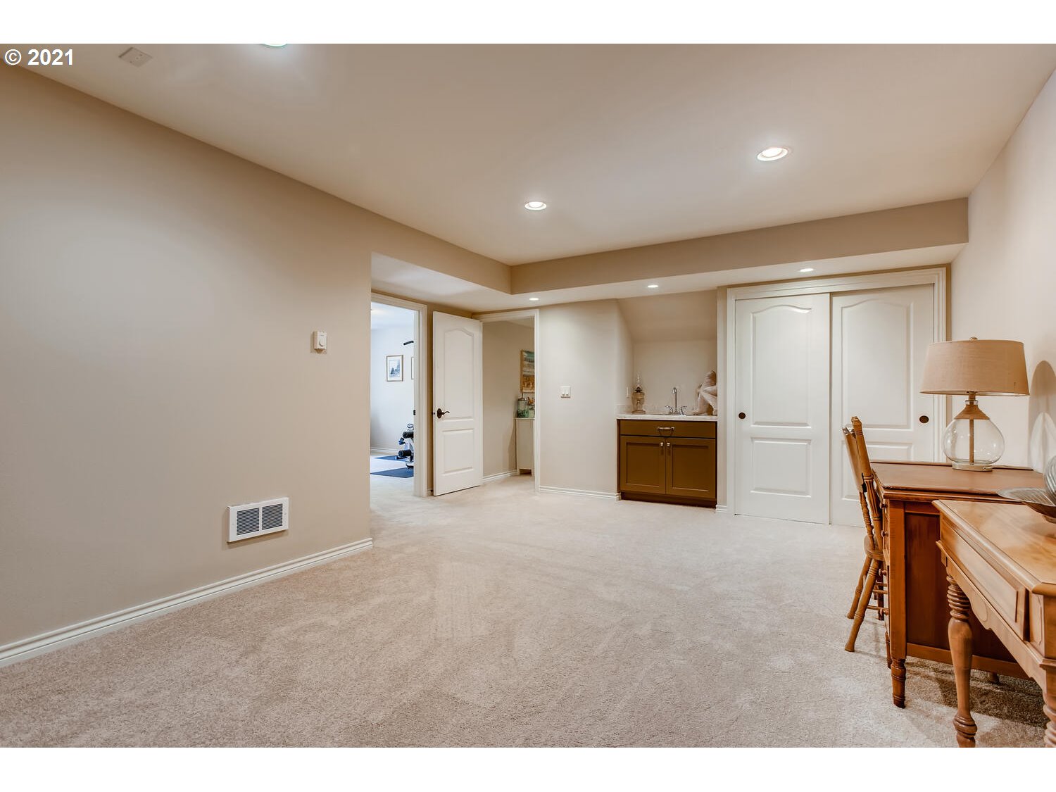 34351 Southwest South Ranch Road Newberg, OR 97132 - Photo 22 of 32 a living room with furniture and a dining table with chair