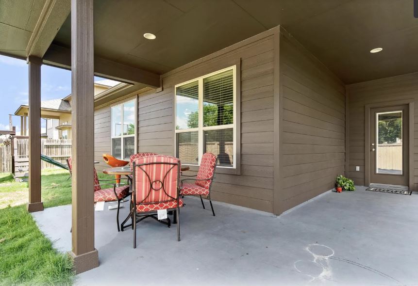 2781 Santa Ana Lane Round Rock, TX 78665 - Photo 19 of 22 a backyard of a house with table and chairs