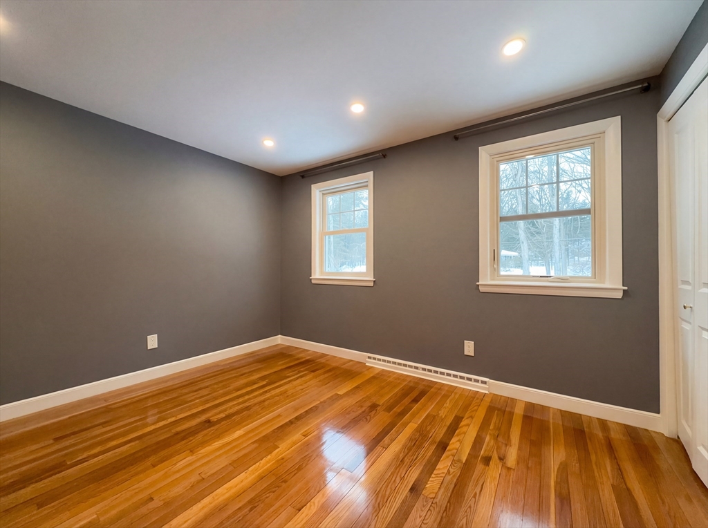 16 Crest Drive Dover, MA 02030 - Photo 14 of 24 a view of empty room with wooden floor