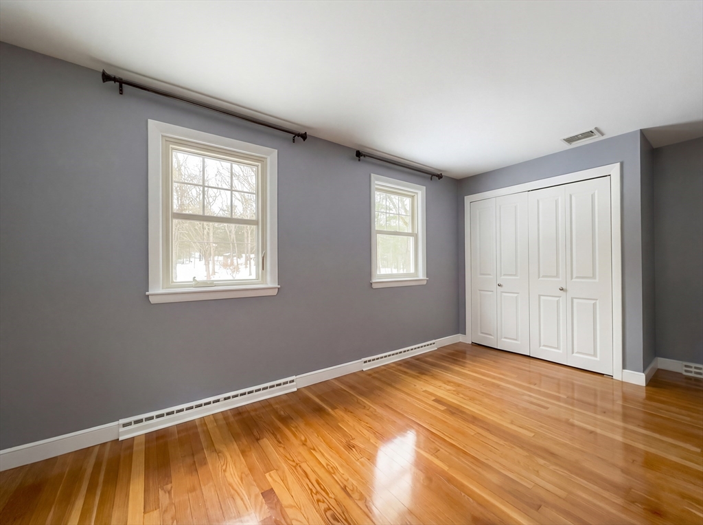 16 Crest Drive Dover, MA 02030 - Photo 17 of 24 a view of a room with wooden floor and window