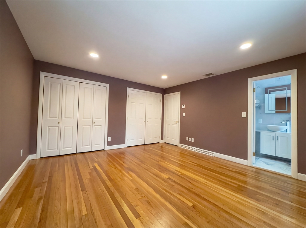 16 Crest Drive Dover, MA 02030 - Photo 4 of 24 a view of an empty room with wooden floor