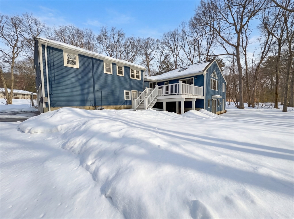 16 Crest Drive Dover, MA 02030 - Photo 5 of 24 a view of a house with a large space