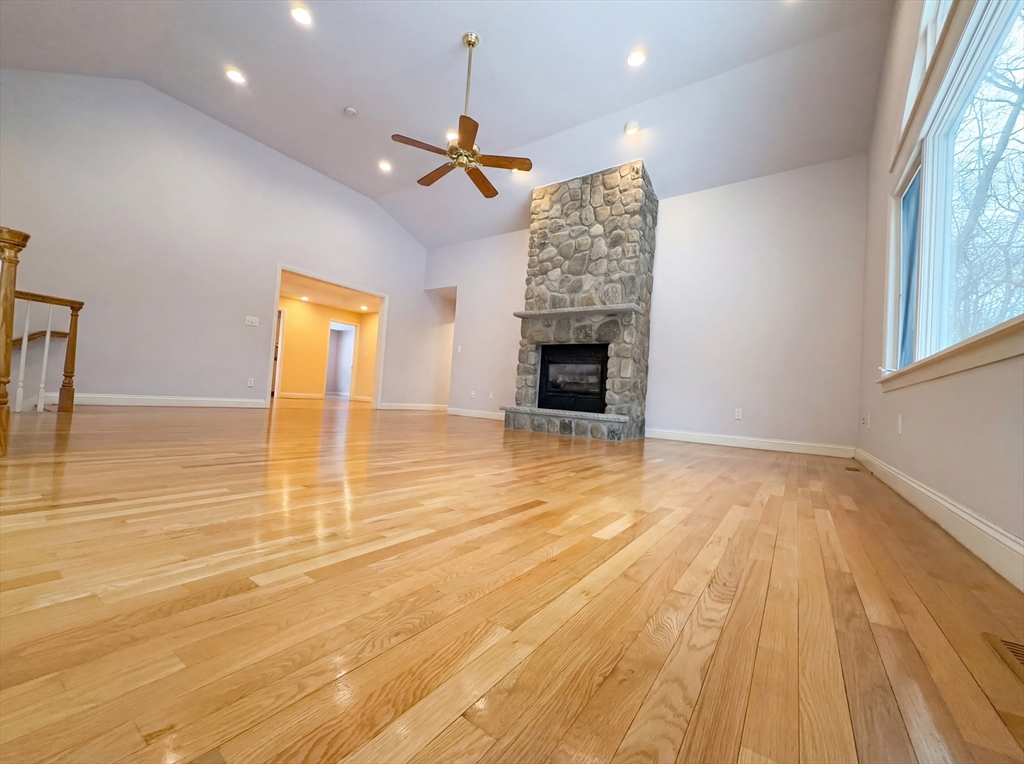 16 Crest Drive Dover, MA 02030 - Photo 7 of 24 a view of empty room with wooden floor and fan