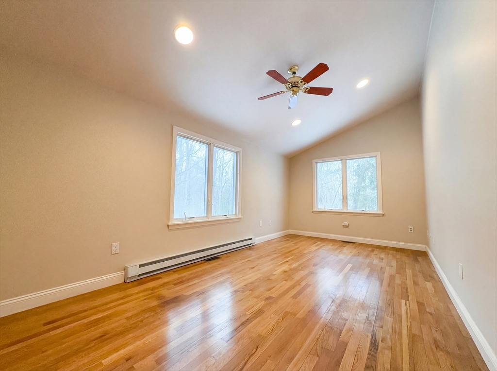 16 Crest Drive Dover, MA 02030 - Photo 9 of 24 wooden floor in an empty room with a window