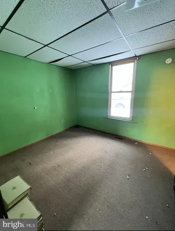 a view of a room that has a window in it