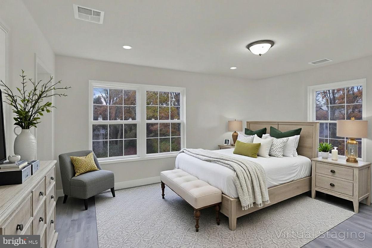 36 Apache Court Absecon, NJ 08205 - Photo 15 of 39 Serene bedroom with natural light and style.