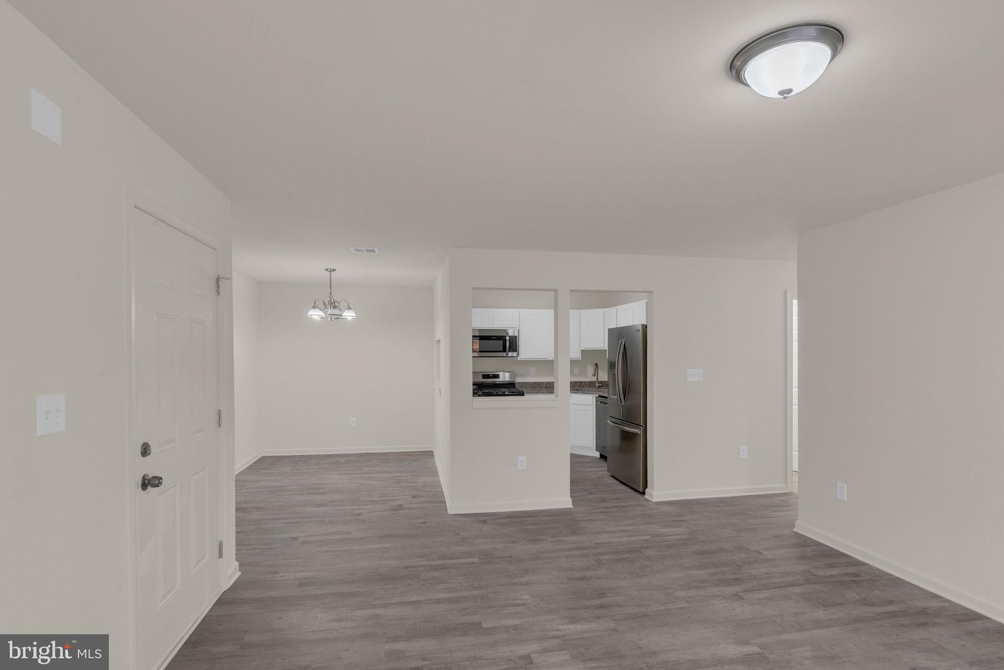 36 Apache Court Absecon, NJ 08205 - Photo 4 of 39 Spacious, modern living area awaits you.