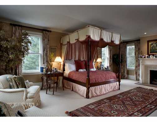 Undisclosed Address Greenwich, CT 06830 - Photo 6 of 7 a bedroom with furniture and a large window