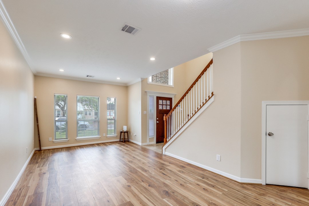 3231 Alabama Street Houston, TX 77004 - Photo 3 of 20 a view of an entryway with wooden floor