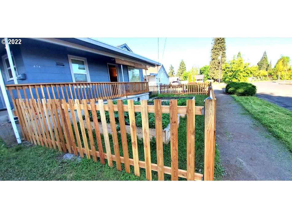 474 Broadway Street Springfield, OR 97477 - Photo 2 of 21 a view of a house with a yard