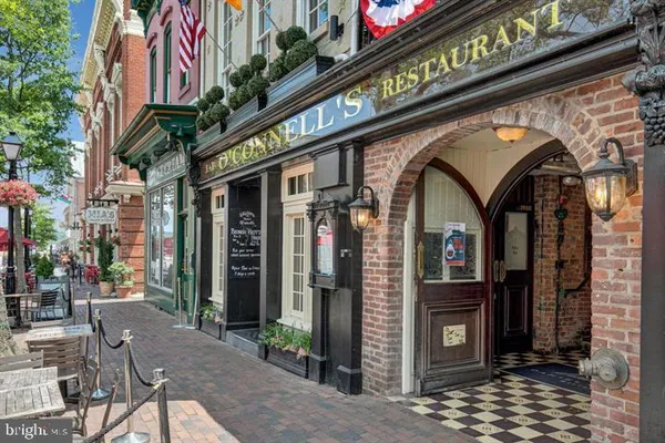 a sign on the side of a street