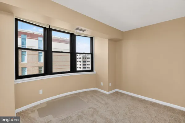 an empty room with windows