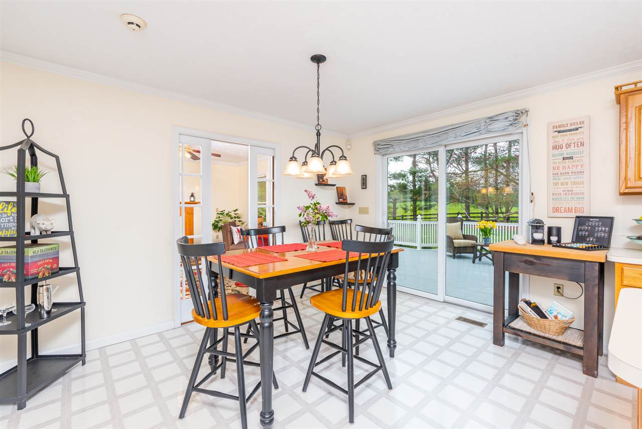 66 Cedar Ridge Road Waynesboro, VA 22980 - Photo 18 of 48 a dining room filled chandelier and wooden floor