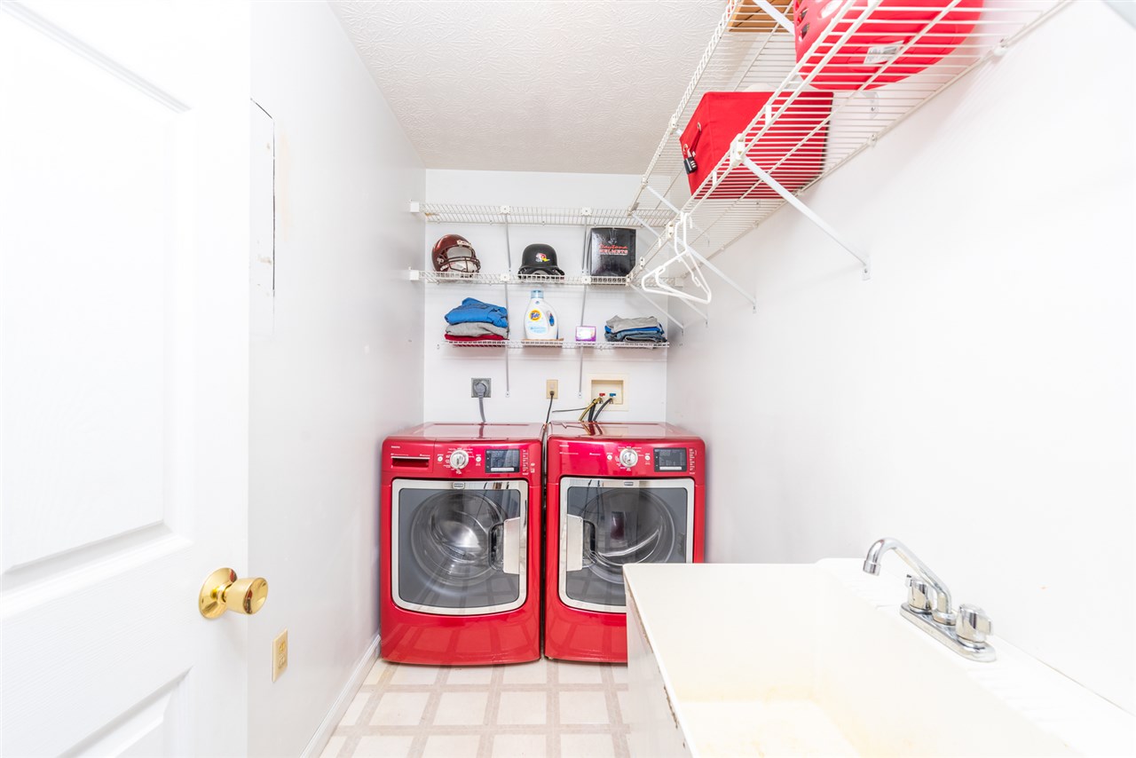 66 Cedar Ridge Road Waynesboro, VA 22980 - Photo 26 of 48 a utility room with a sink and wooden floor