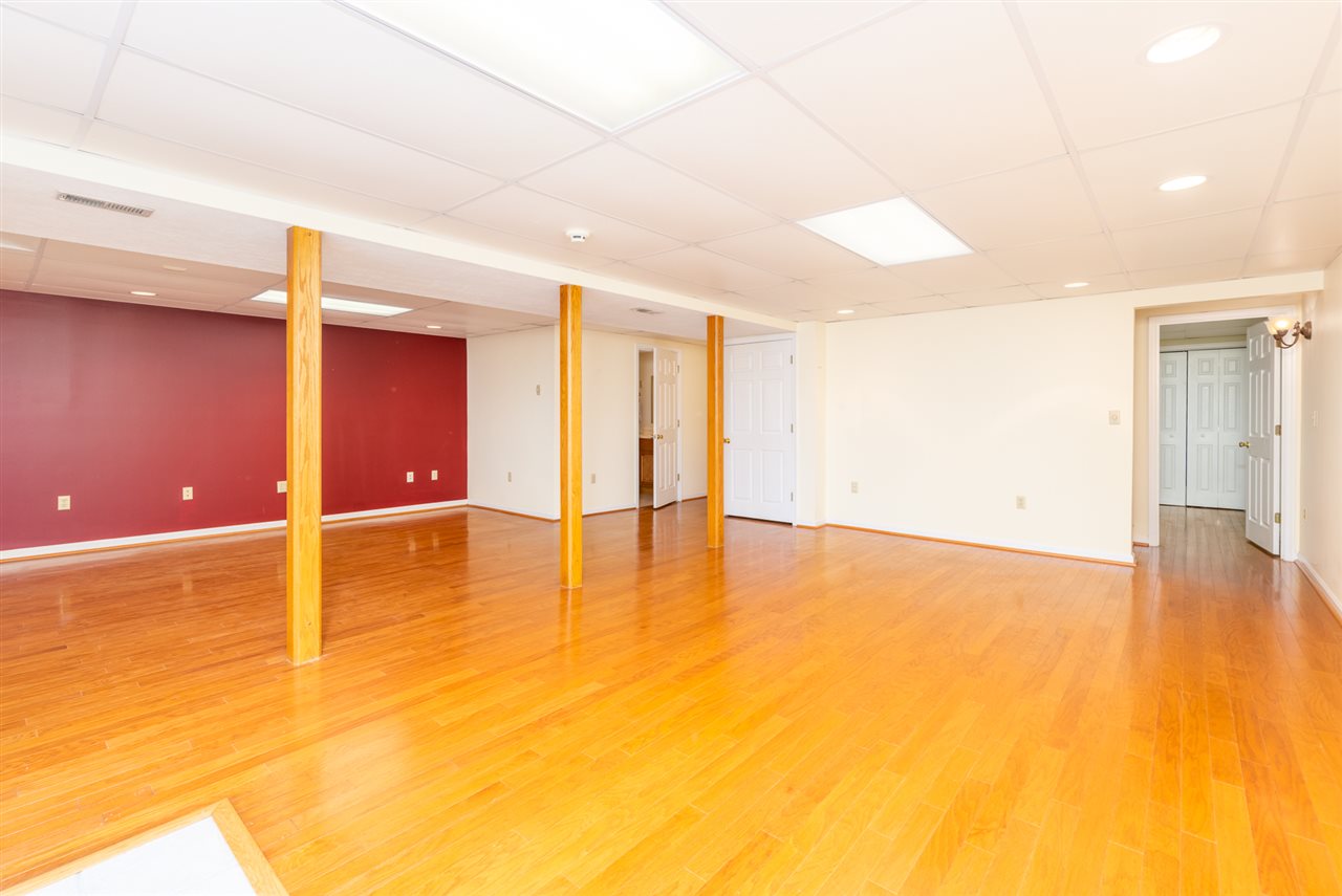 66 Cedar Ridge Road Waynesboro, VA 22980 - Photo 38 of 48 a view of an empty room with wooden floor