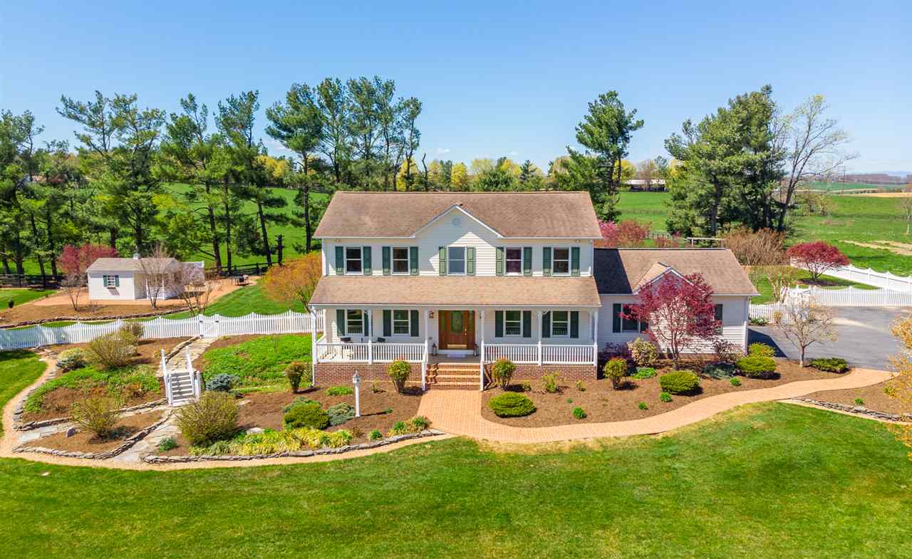 66 Cedar Ridge Road Waynesboro, VA 22980 - Photo 4 of 48 a view of a house with a garden and swimming pool