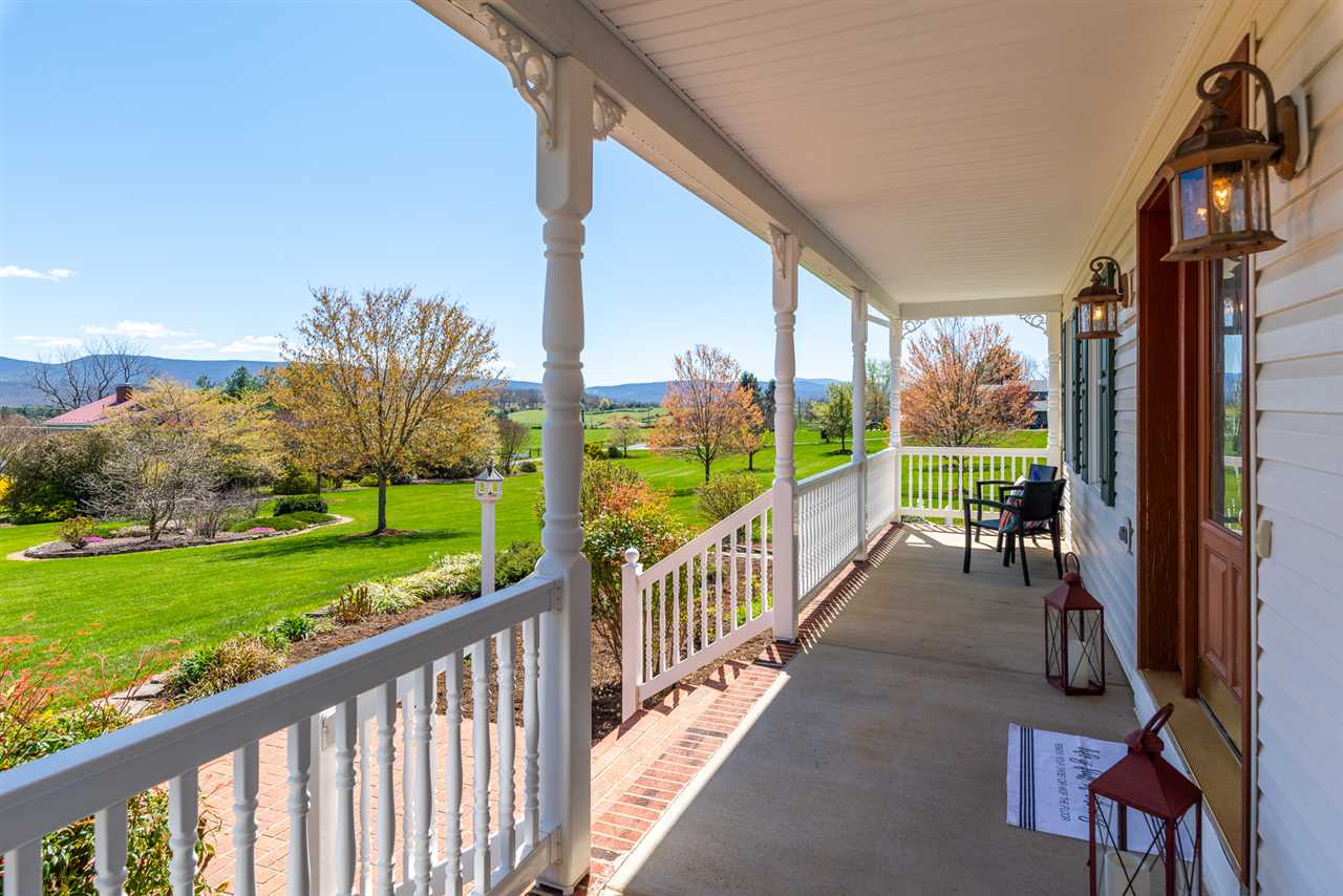 66 Cedar Ridge Road Waynesboro, VA 22980 - Photo 8 of 48 a view of a porch with wooden floor and fence