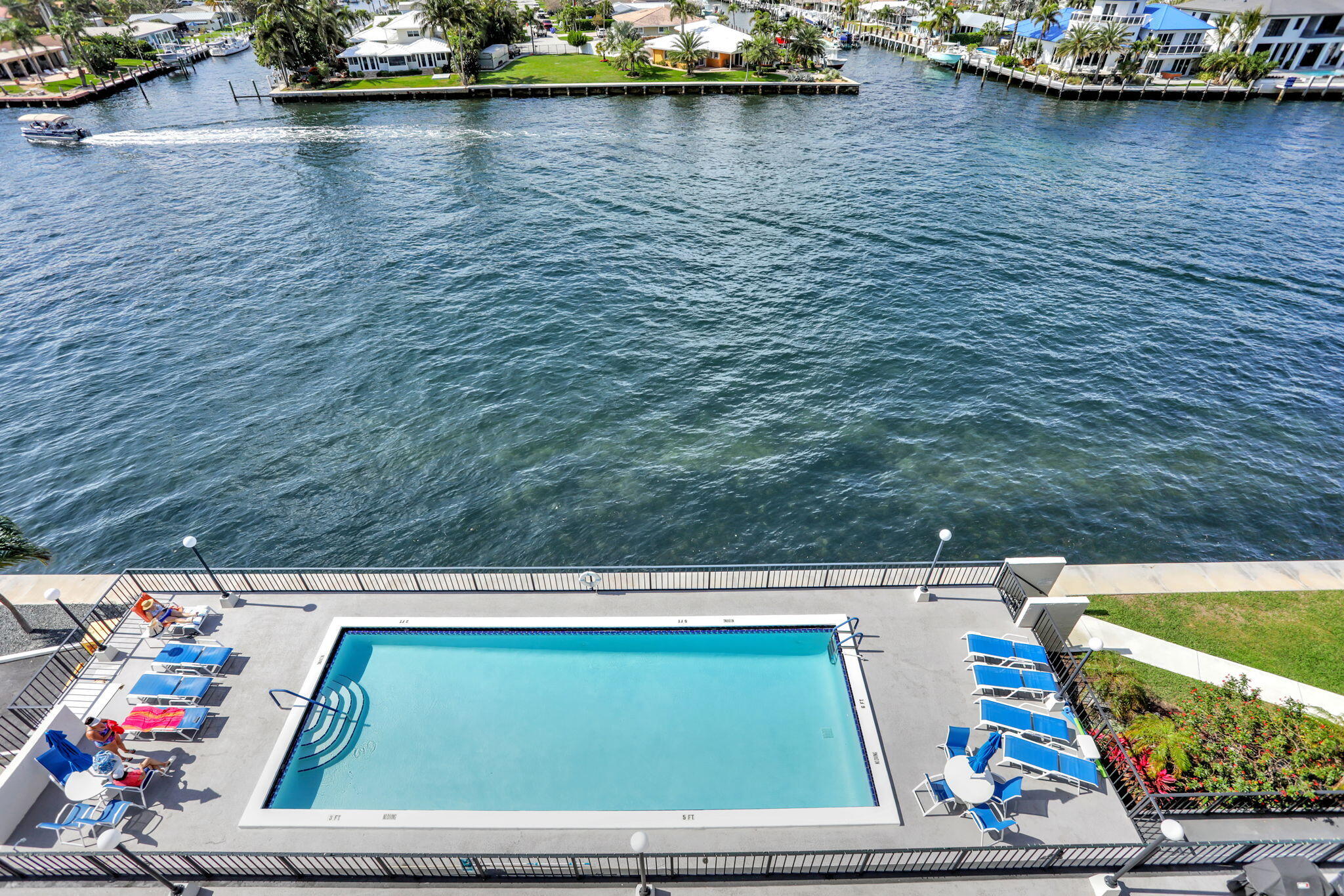 521 North Riverside Drive, Unit 603 Pompano Beach, FL 33062 - Photo 5 of 26 Pool View from the Open Patio