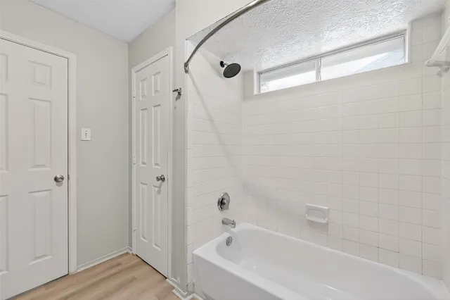 a bathroom with a bathtub
