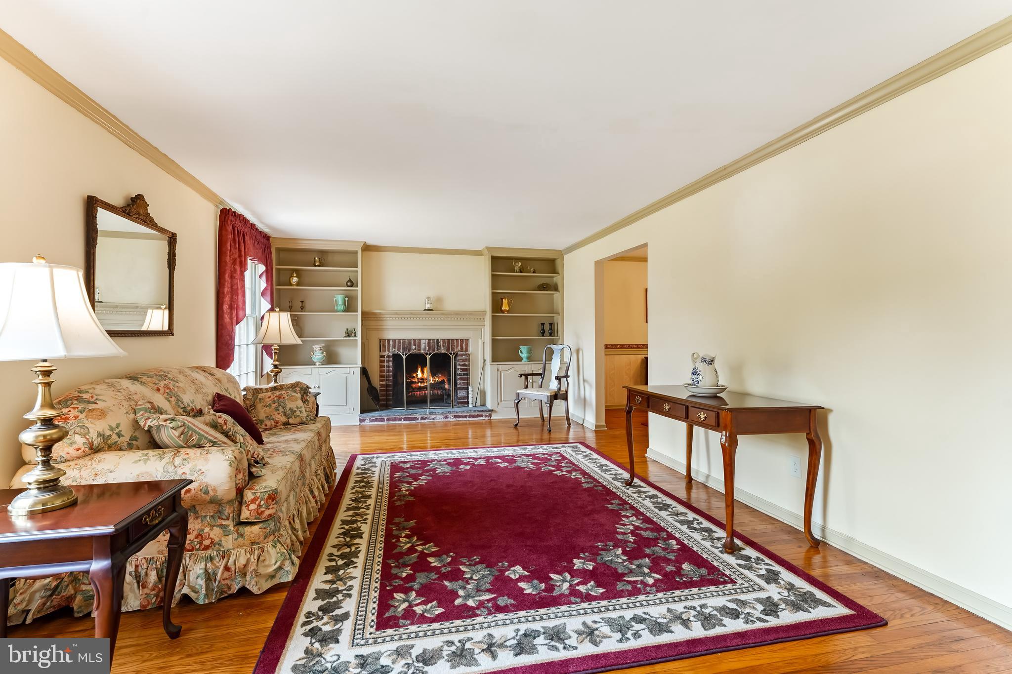 1060 Waterloo Road Berwyn, PA 19312 - Photo 9 of 43 Wood burning fireplace and custom built-ins