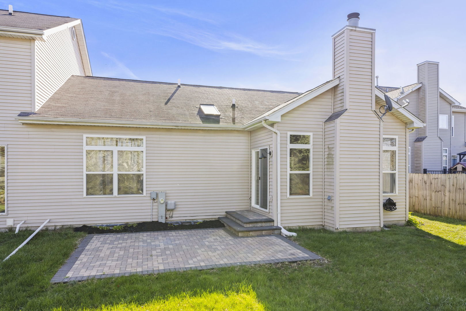 580 Chestnut Drive Oswego, IL 60543 - Photo 18 of 20 a view of a house with a yard