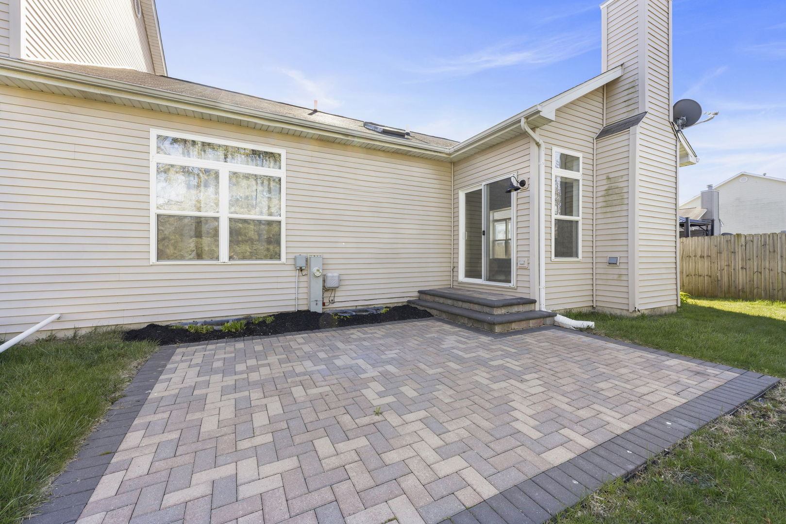 580 Chestnut Drive Oswego, IL 60543 - Photo 19 of 20 a view of a house with a yard