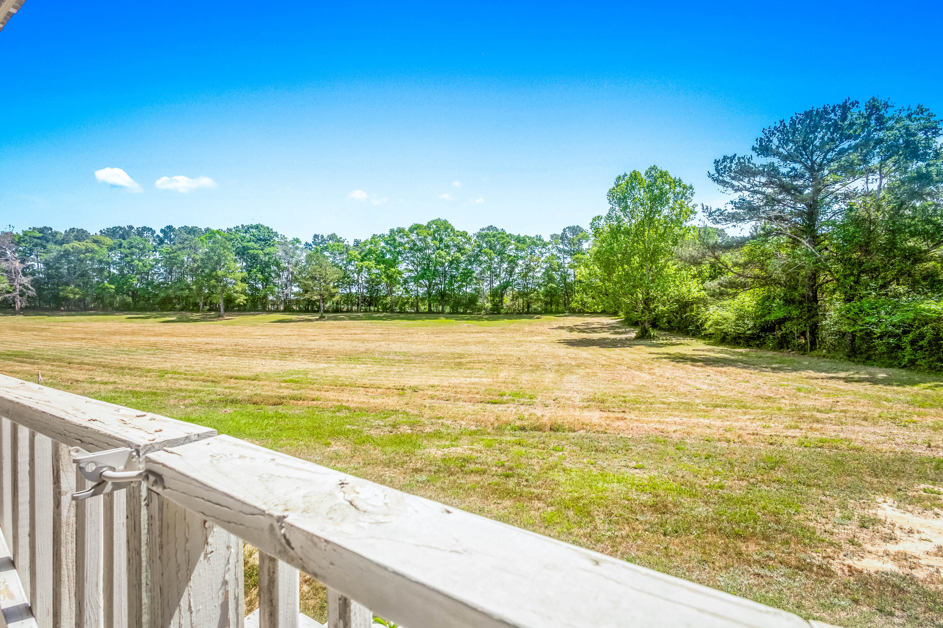 1650 Perkins Road Laurel Hill, FL 32567 - Photo 17 of 47 a view of an ocean from a balcony