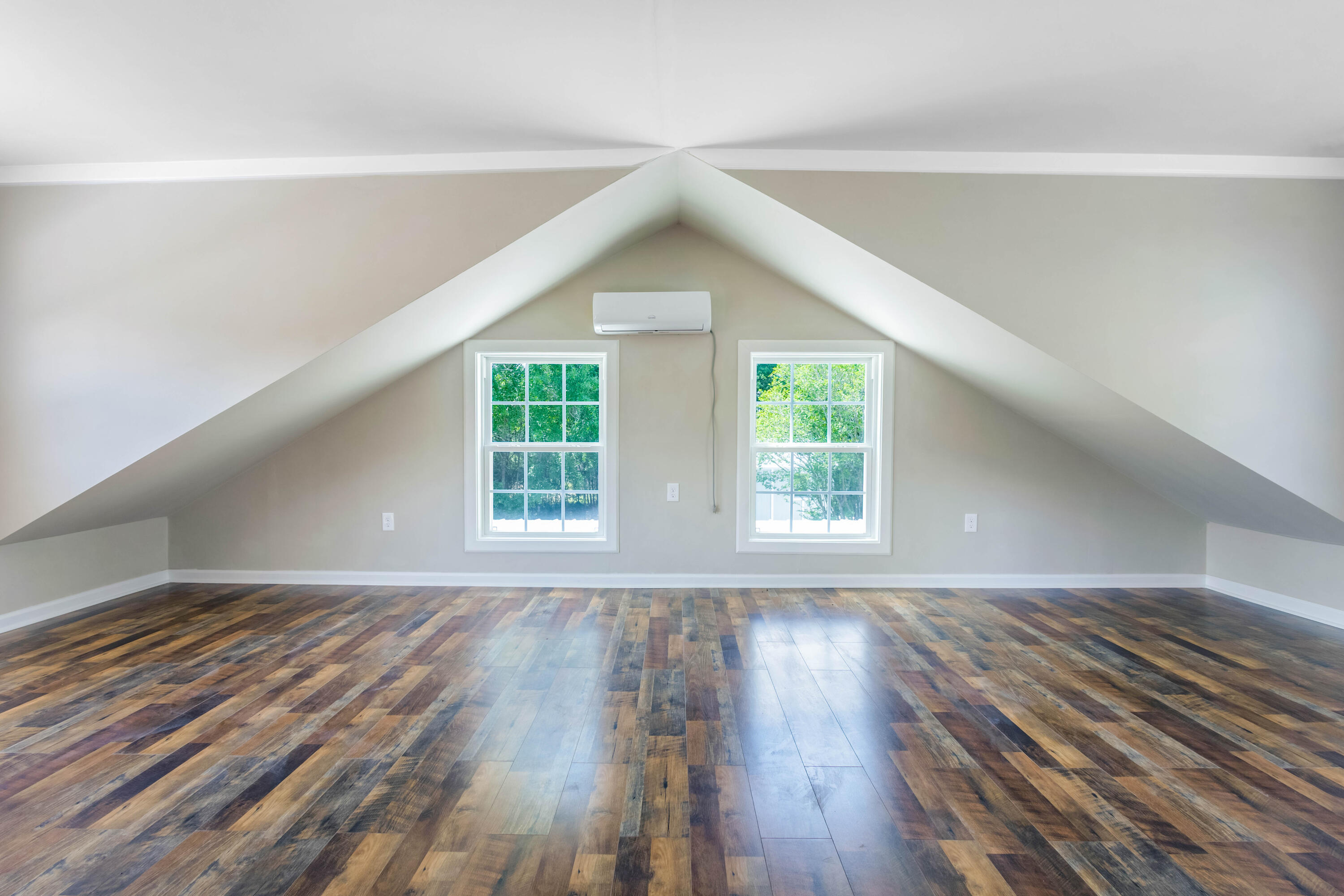 1650 Perkins Road Laurel Hill, FL 32567 - Photo 31 of 47 an empty room with wooden floor and windows