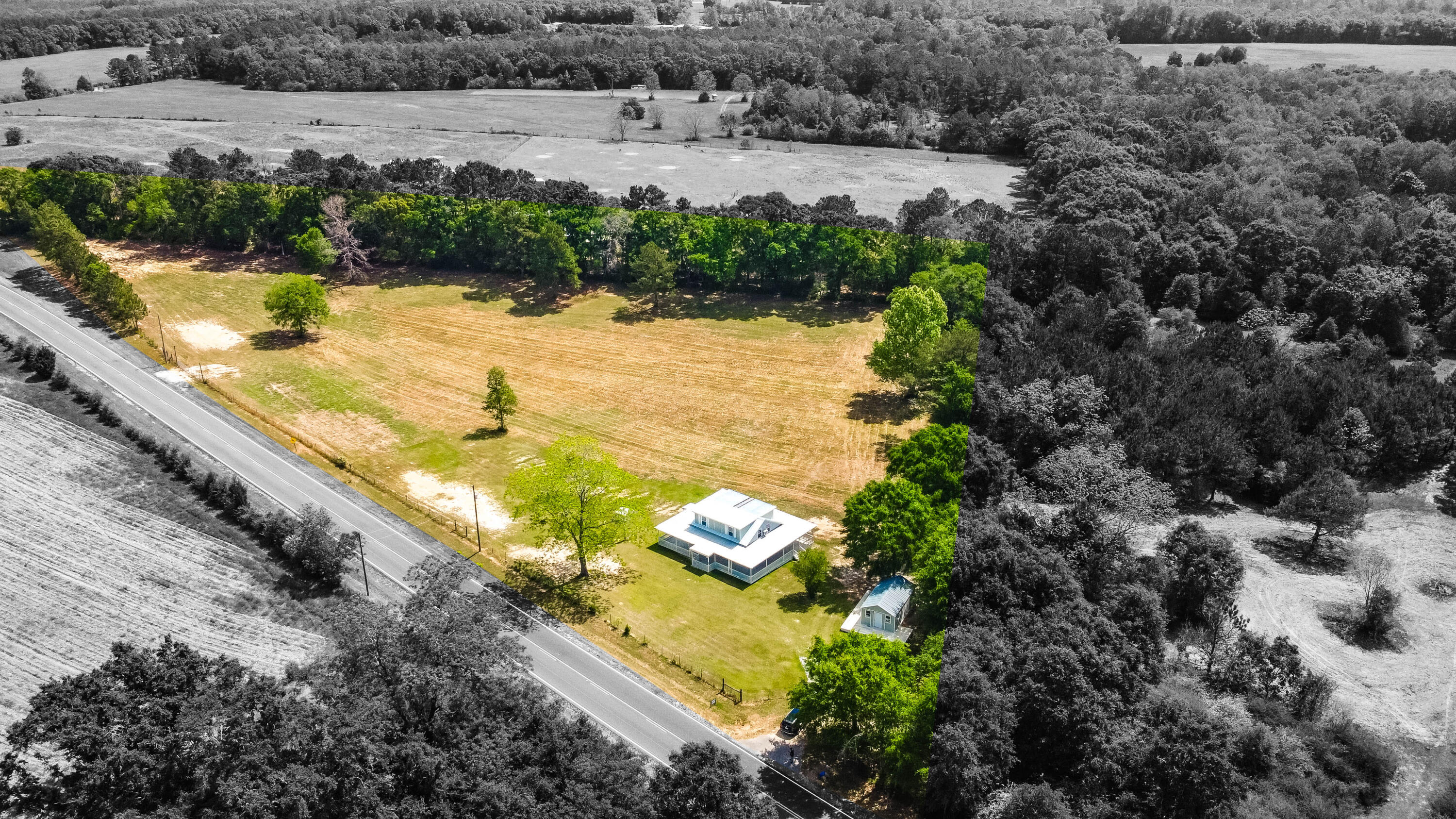 1650 Perkins Road Laurel Hill, FL 32567 - Photo 4 of 47 a view of a lake with outdoor space