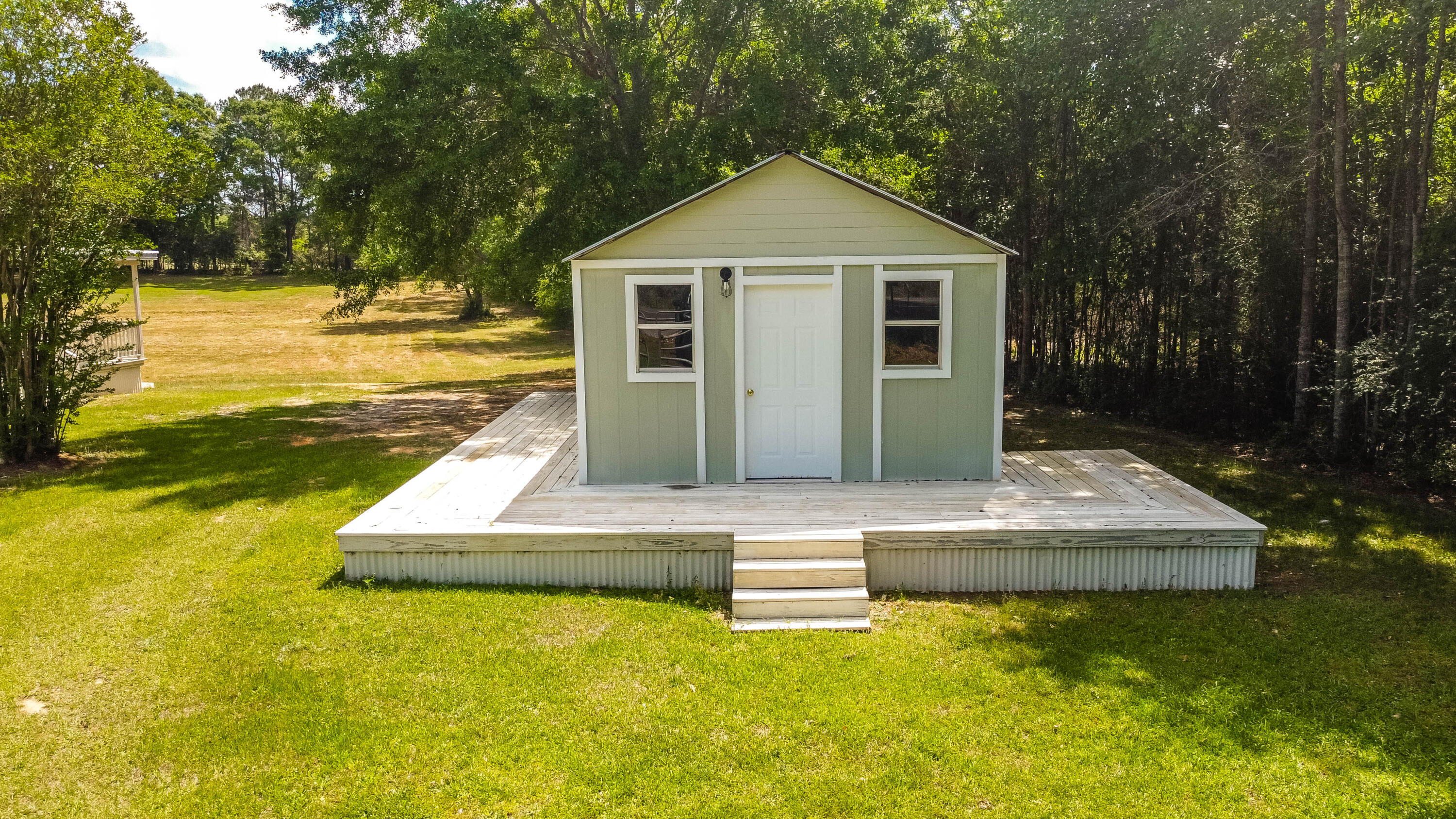 1650 Perkins Road Laurel Hill, FL 32567 - Photo 5 of 47 a view of a house with pool