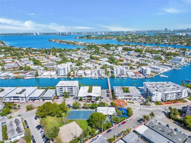 an aerial view of a city with lots of residential buildings