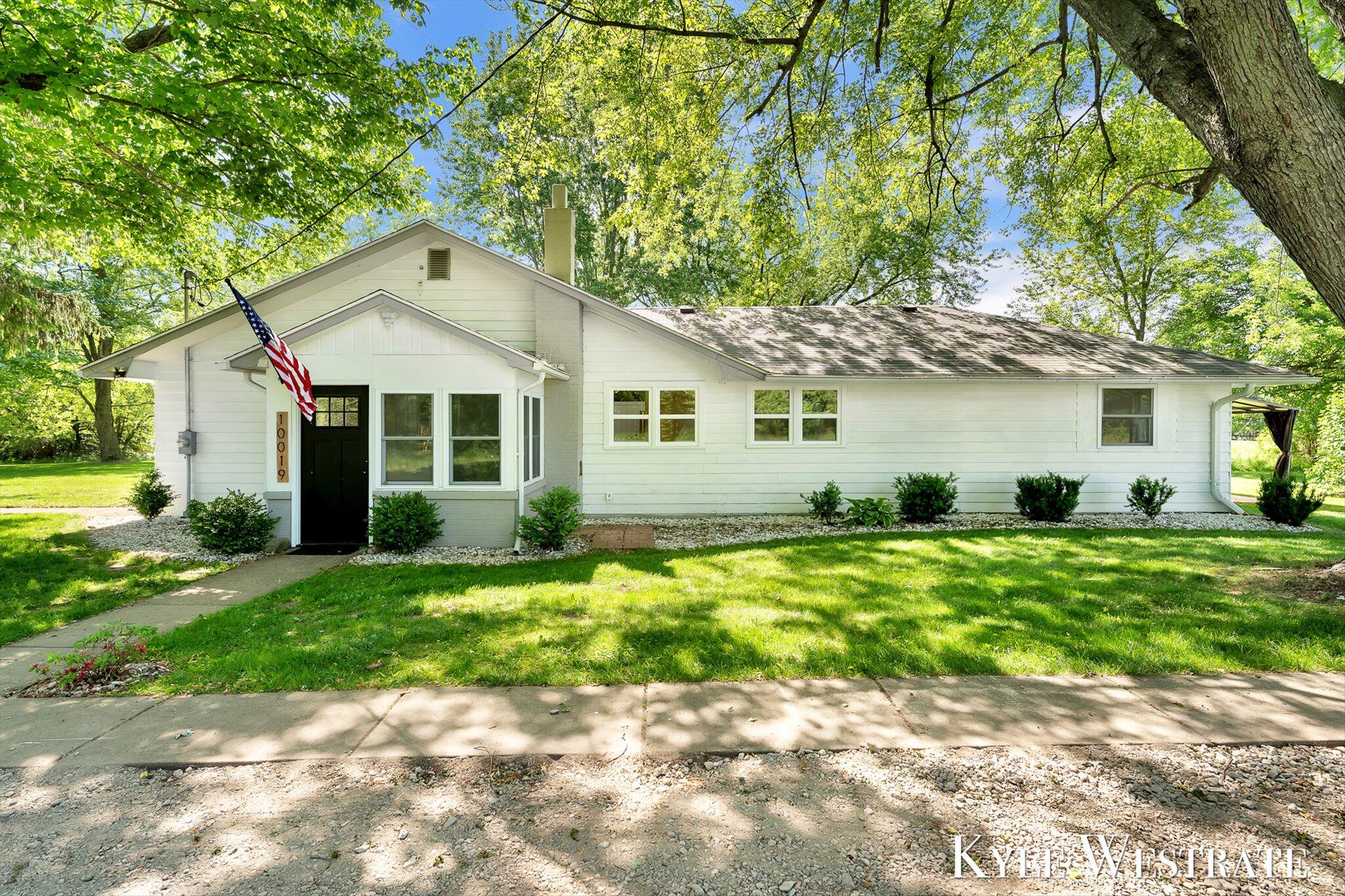 10019 10 Mile Road Northeast Rockford, MI 49341 - Photo 1 of 32 01-ELY07173