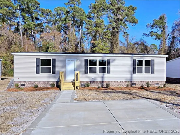 a view of a house with a patio