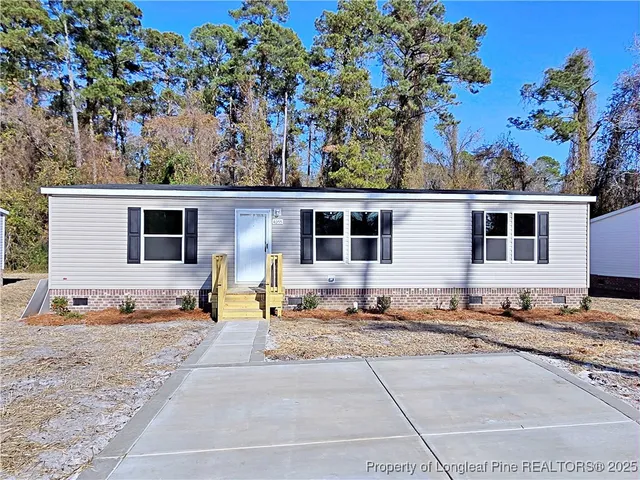 a view of a house with a patio