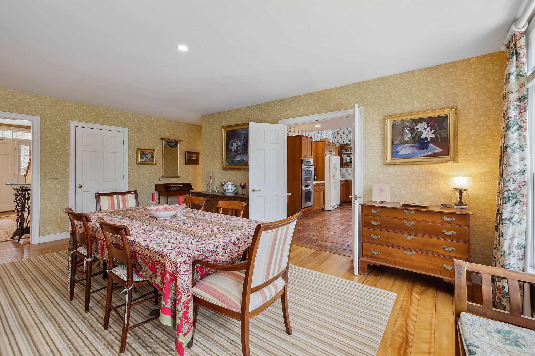 46 Freeman Lane Orleans, MA 02653 - Photo 19 of 74 a view of a dining room with furniture and window