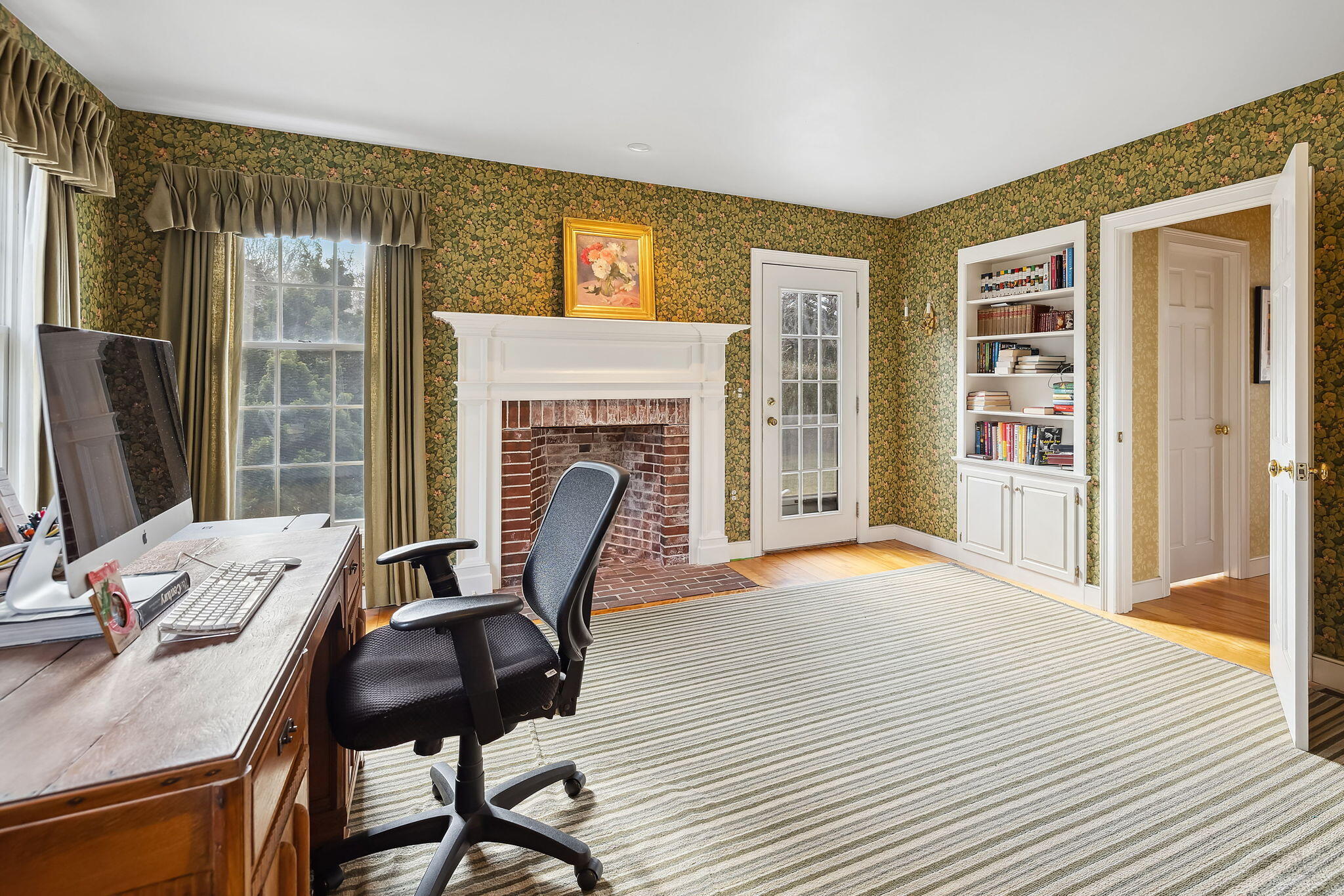 46 Freeman Lane Orleans, MA 02653 - Photo 24 of 74 a view of a livingroom with furniture and a fireplace
