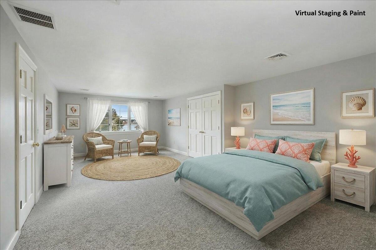 46 Freeman Lane Orleans, MA 02653 - Photo 37 of 74 a bedroom with a bed and window
