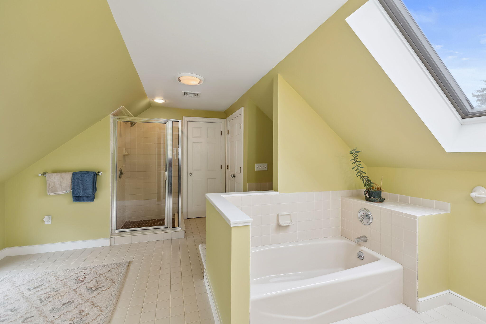 46 Freeman Lane Orleans, MA 02653 - Photo 40 of 74 a bathroom with a bathtub and shower