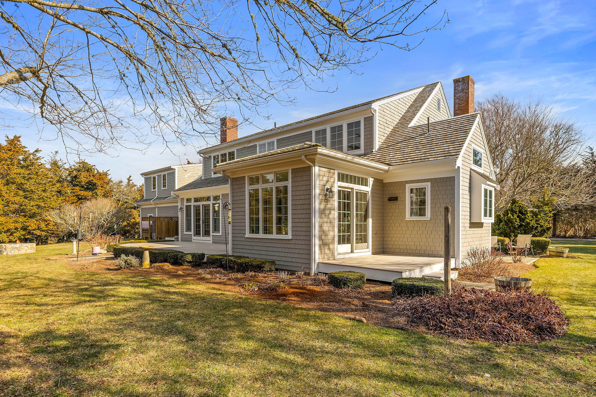 46 Freeman Lane Orleans, MA 02653 - Photo 48 of 74 a front view of a house with a yard
