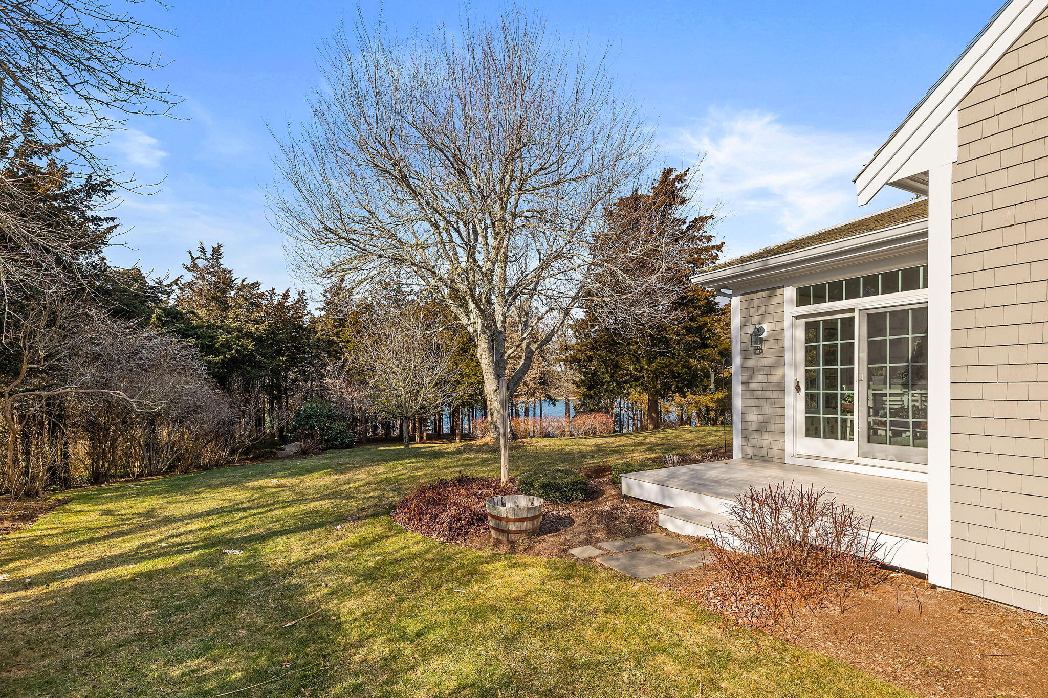 46 Freeman Lane Orleans, MA 02653 - Photo 49 of 74 a view of a house with backyard and trees