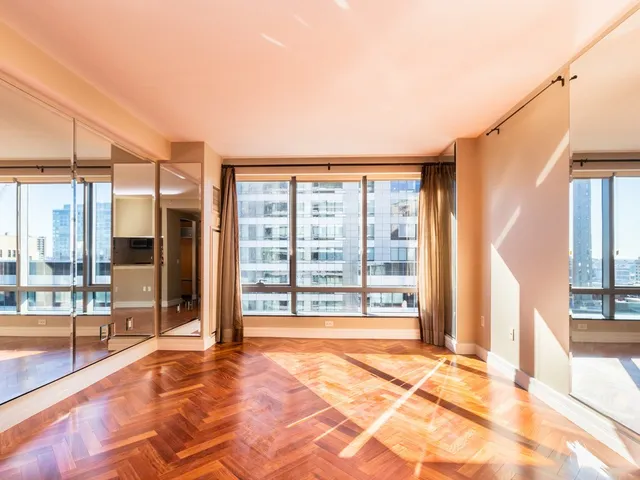 a view of a room with a large window