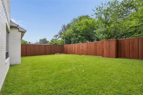 a view of a backyard with a garden